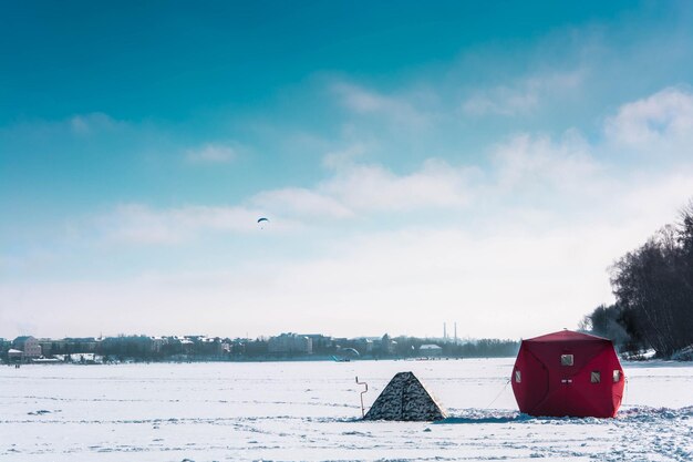 Scenic view of frozen lake against sky