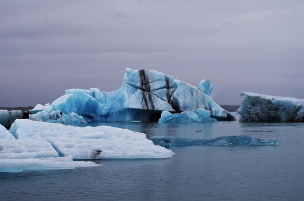 Scenic view of frozen sea against sky