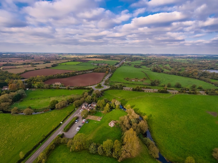 Photo scenic view of green landscape against sky