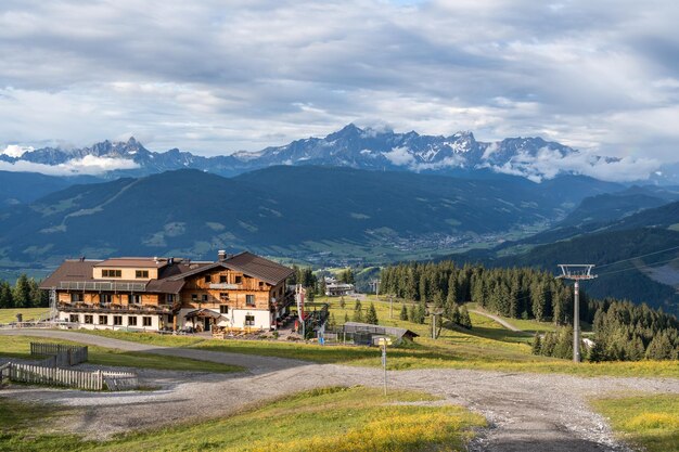 Scenic view of houses and mountains against sky