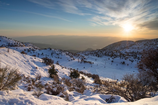 Scenic view of israeli hermon snowcapped mountain against sky during sunset exotic winter