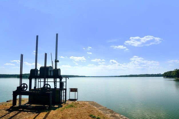 Scenic view of lake against blue sky