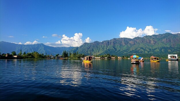 Scenic view of lake against blue sky