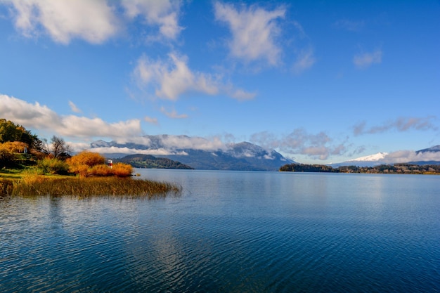 Scenic view of lake against blue sky