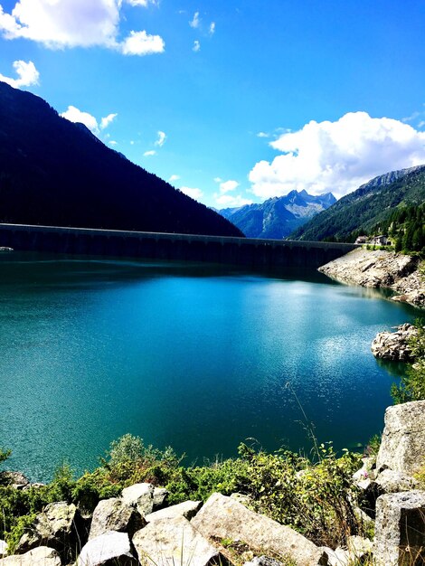 Scenic view of lake against blue sky