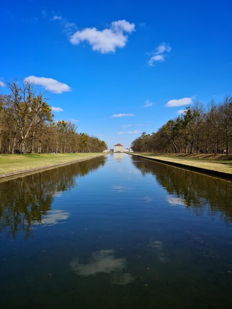 Scenic view of lake against blue sky