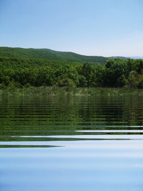 Scenic view of lake against clear sky