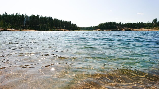 Photo scenic view of lake against clear sky