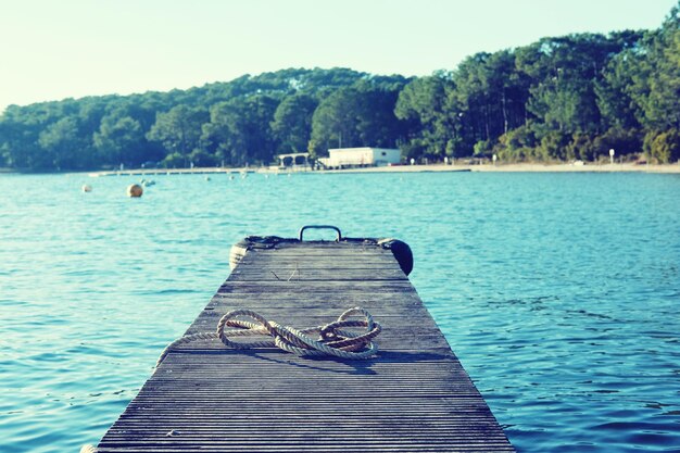 Photo scenic view of lake against clear sky