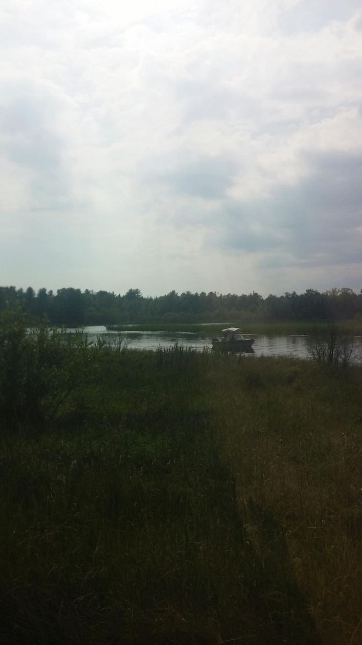 Photo scenic view of lake against cloudy sky