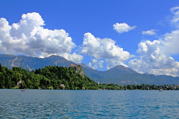 Scenic view of lake against cloudy sky