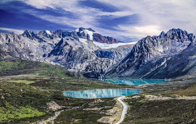 Scenic view of lake against cloudy sky