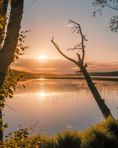 Photo scenic view of lake against sky during sunset