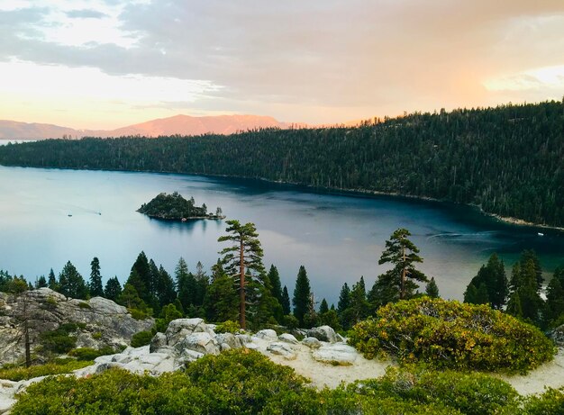 Scenic view of lake against sky during sunset