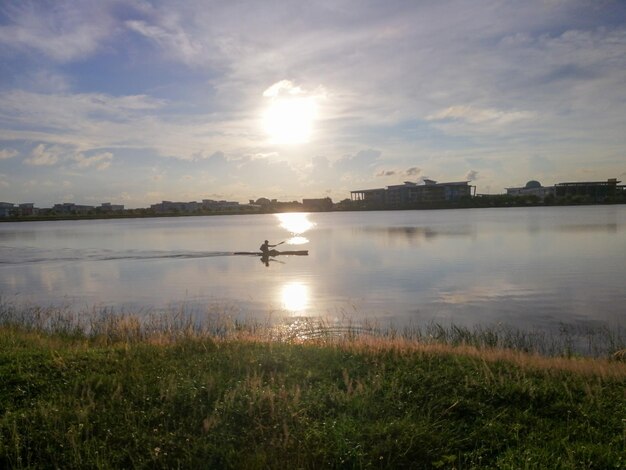 Scenic view of lake against sky during sunset