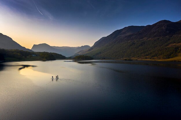 Scenic view of lake against sky during sunset