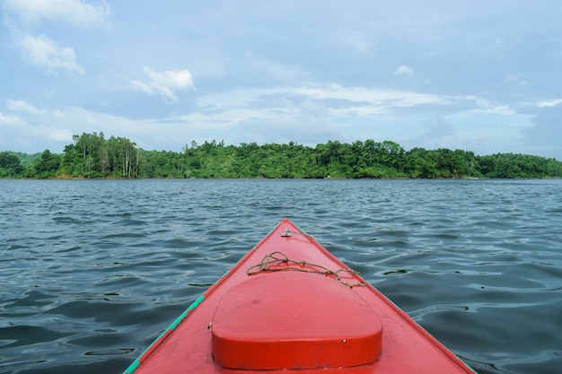 Scenic view of lake against sky kayaking on the lake