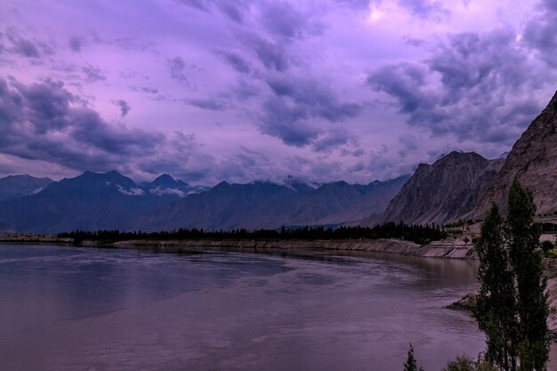 Scenic view of lake against sky at sunset