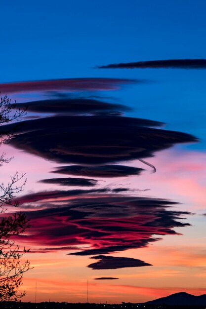 Scenic view of lake against sky at sunset