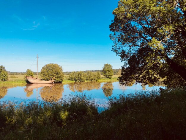 Photo scenic view of lake against sky