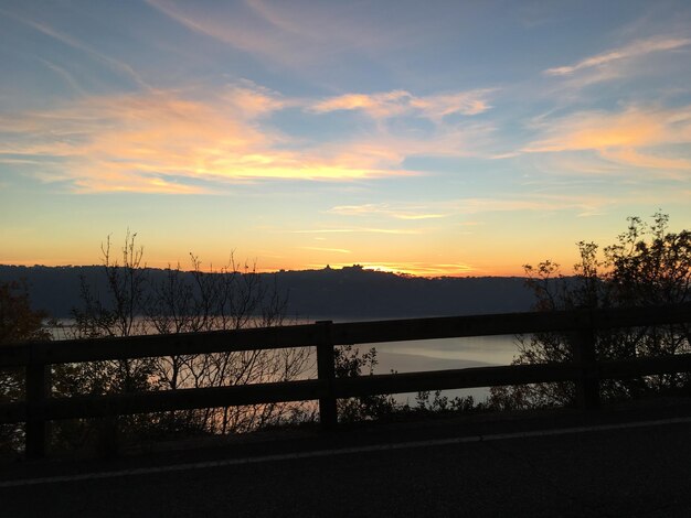 Scenic view of lake during sunset