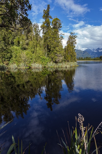 Scenic view of Lake Matheson in New Zealand in summertime