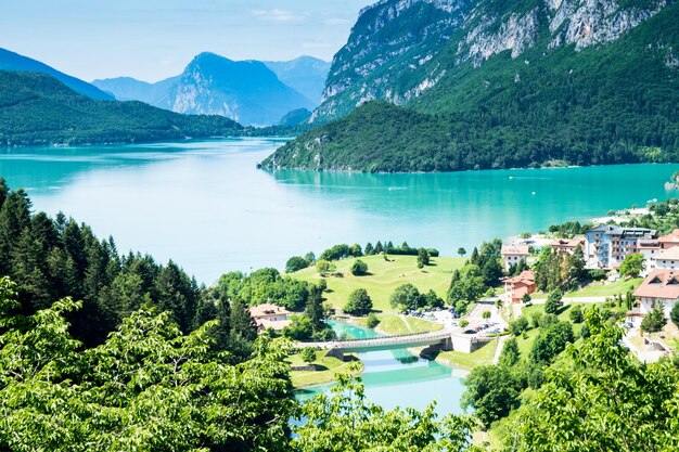 Scenic view of lake and mountains against sky