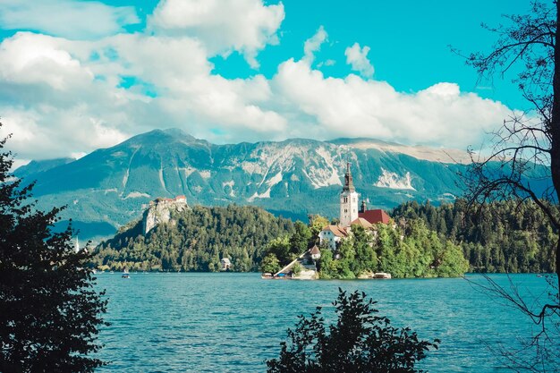 Scenic view of lake and mountains against sky