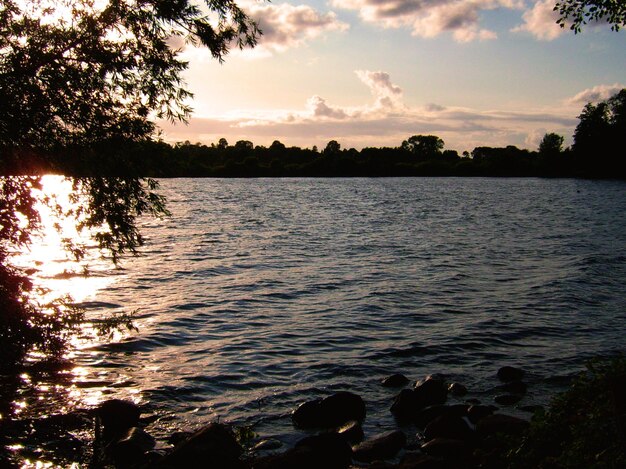 Scenic view of lake during sunset