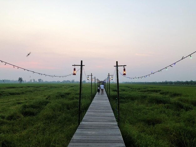 Scenic view of land against sky during sunset