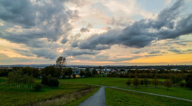 Scenic view of land against sky during sunset