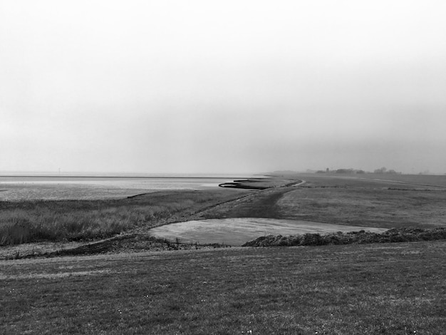 Photo scenic view of land against sky