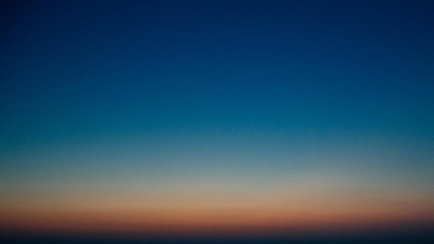 Photo scenic view of landscape against blue sky