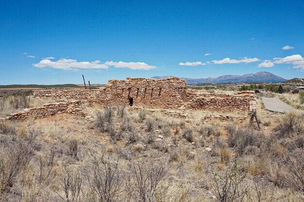 Scenic view of landscape against blue sky