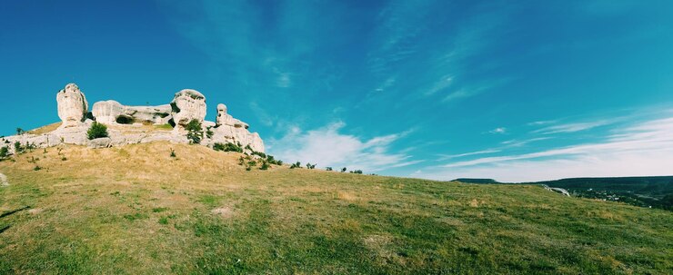 Photo scenic view of landscape against blue sky