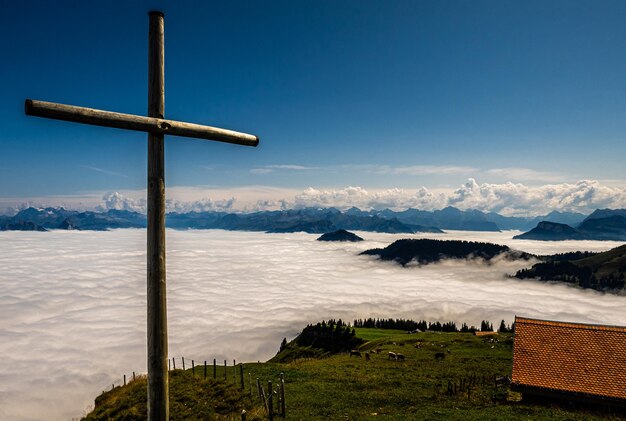 Scenic view of landscape against blue sky