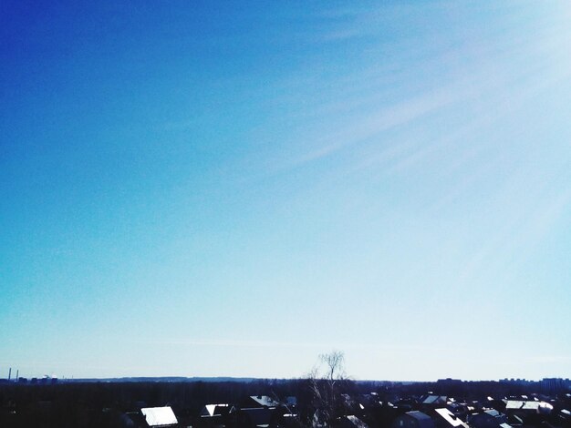 Scenic view of landscape against clear blue sky