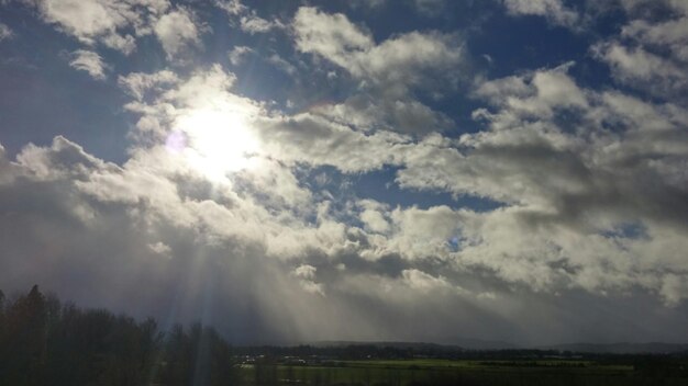 Scenic view of landscape against cloudy sky