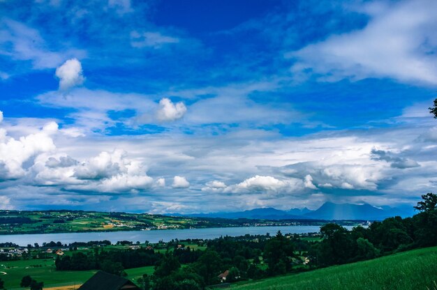 Scenic view of landscape against cloudy sky