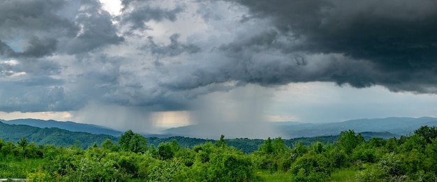 Photo scenic view of landscape against cloudy sky