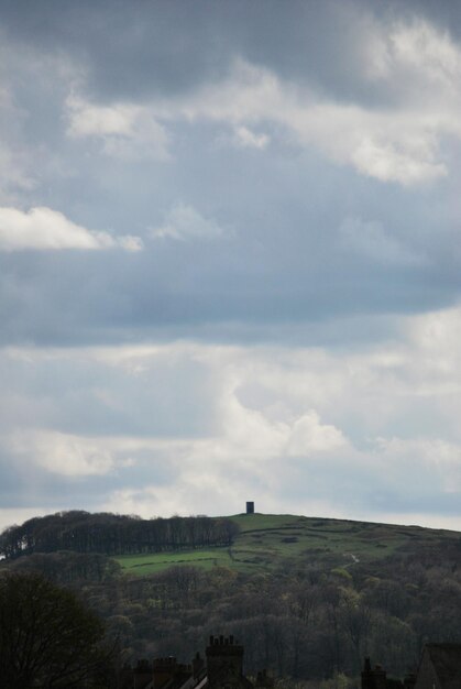 Scenic view of landscape against cloudy sky