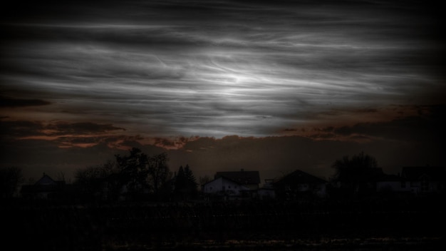 Photo scenic view of landscape against cloudy sky