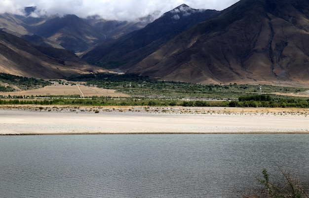 scenic view of landscape against mountains