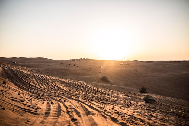 Photo scenic view of landscape against sky during sunset