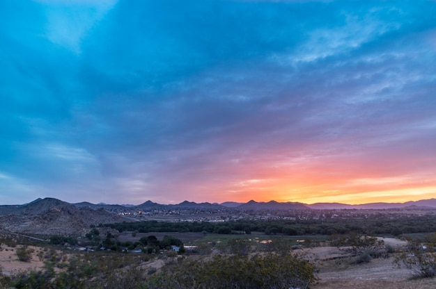 Scenic view of landscape against sky during sunset