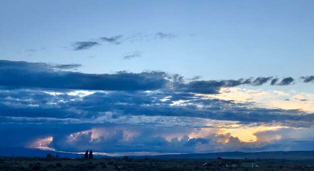 Scenic view of landscape against sky during sunset