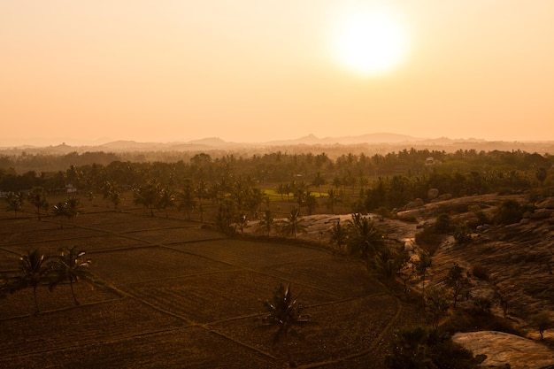 Scenic view of landscape against sky during sunset