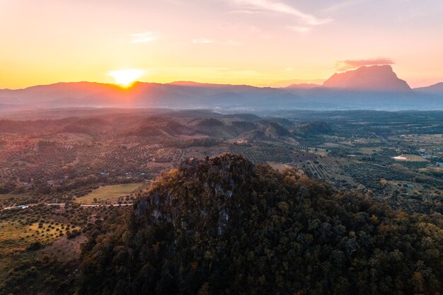 Scenic view of landscape against sky during sunset