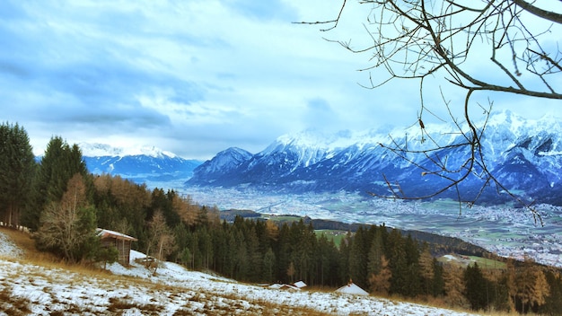 Scenic view of landscape against sky during winter