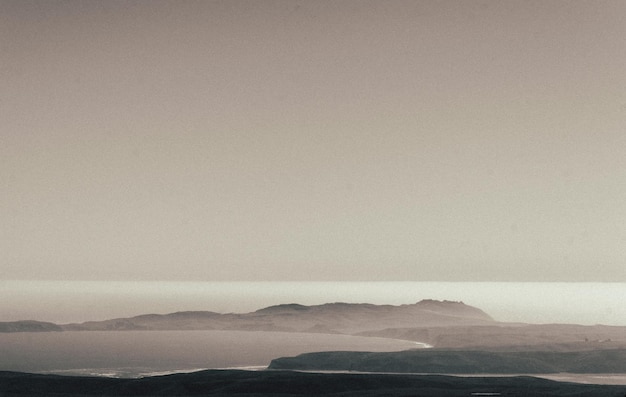 Photo scenic view of landscape against sky